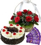 send Half Kg Black Forest Cake Red Roses Basket n Chocolate  delivery