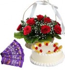 send Half Kg Pineapple Cake Red Roses Basket n Chocolate  delivery