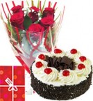 send  Eggless Black Forest Cake Half Kg with Red Roses bunch Combo  delivery