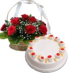 send Eggless Pineapple Cake Half Kg N Red Roses Basket delivery