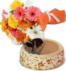 send Eggless Butterscotch Cake Half Kg N Gerberas Bouquet delivery