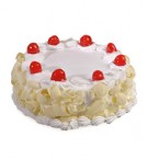 send Half Kg White Forest cake delivery