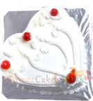 send 1Kg heart shaped vanilla cake delivery
