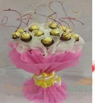 send 16 ferrero rocher bouquet delivery