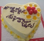 send 1kg butterscotch cake heart shape delivery