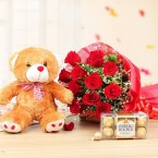 send 12 red roses bouquet 1 brown teddy 12 inch box of 16 ferrero rocher chocolates delivery