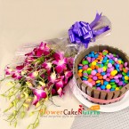 send half kg kitkat gems cake and 5 orchid flower bouquet delivery