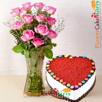 send 1kg eggless red velvet gems heart shape cake 12 pink roses in a vase delivery