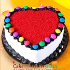 send 1kg eggless hearty red Velvet Gems Cake delivery