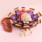 send Chocolicious Nutty Hamper delivery