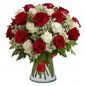 white and red roses in a vase