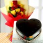 half kg heart shape chocolate Truffle cake n yellow red roses bouquet
