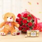 12 red roses bouquet 1 brown teddy 12 inch box of 16 ferrero rocher chocolates