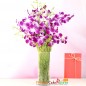 12 purple orchid in a vase
