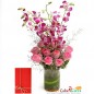 10 pink carnations 4 purple orchids basket