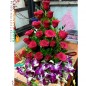 20 red roses 3 purple orchids basket