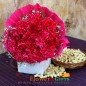 10 red carnation flowers bouquet and half kg cashews dry fruit
