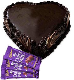 send 1kg Heart Shape Chocolate Truffle Cake N Chocolate delivery