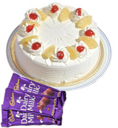send Pineapple Cake Half Kg N Chocolate Gifts delivery