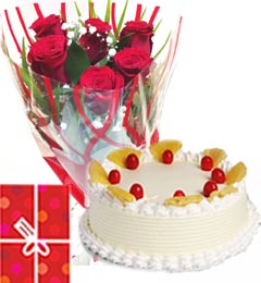 send Eggless Pineapple Cake Half Kg with Red Roses bunch Combo delivery