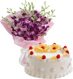 send Eggless Pineapple Cake Half Kg N Orchids Bouquet delivery