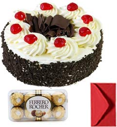 send Just Eggless Black Forest Cake Half Kg with ferrero rocher chocolate  delivery