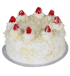 send 1Kg Eggless White Forest cake delivery