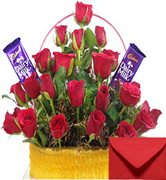 send Basket Arrangement of Red Roses n Cadbury Dairy Milk Chocolates  delivery