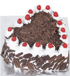 send Yummy 2Kg Heart Shape Black Forest Cake delivery