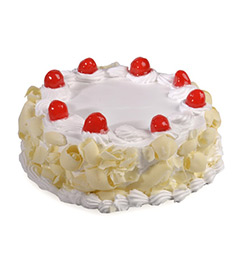 send Half Kg Eggless White Forest Cake delivery