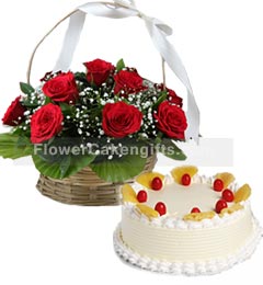 send Pineapple Cake Half Kg N Red Roses Basket delivery