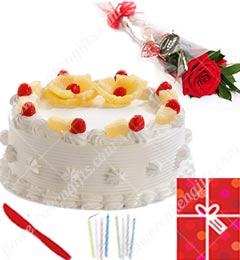 send Half Kg Pineapple Cake Candle Greeting Card n Roses delivery