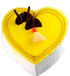 send Rich Pineapple Heartshape Cake delivery