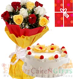 send Eggless 1Kg Pineapple Cake 10 Mix Roses bouquet with Greeting Card delivery