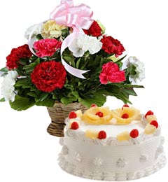 send Pineapple Cake Half Kg N Carnations Basket delivery