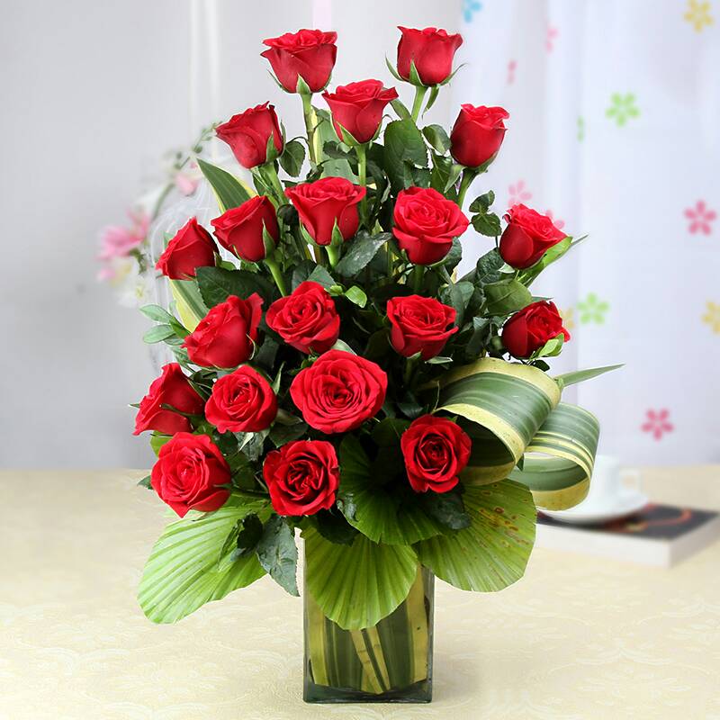 send 20 red roses in a vase delivery