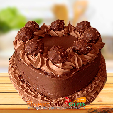 send 1 kg heart shape ferroche Chocolate cake delivery