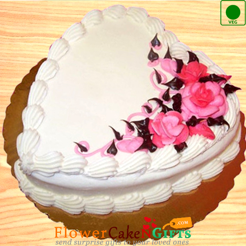 send Half Kg Eggless Pineapple Cake Heart Shaped delivery