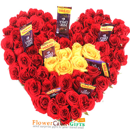 92 red roses 8 yellow roses 7 dairy milk chocolates heart shaped arrangement