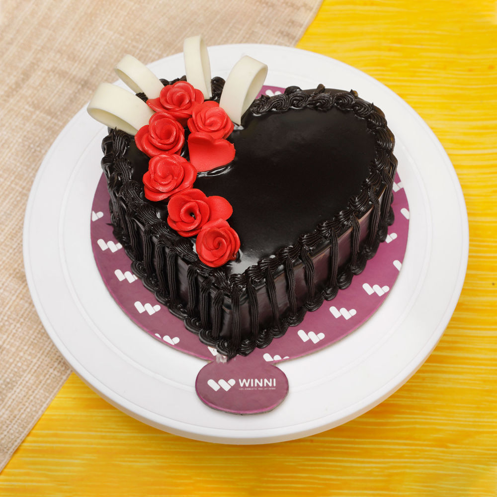 send 1Kg Dark Chocolate Heart Shape Cake delivery