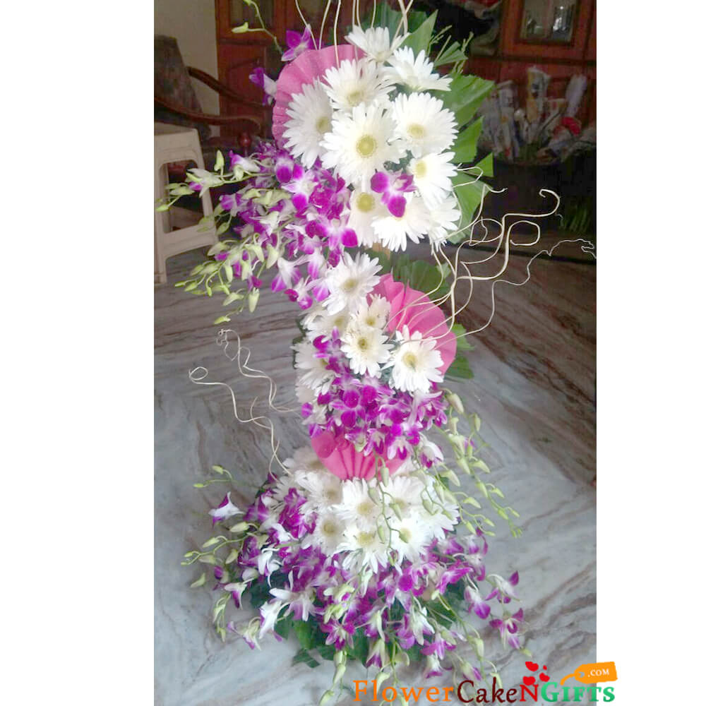 send majestic purple orchid gerberas  tall arrangement delivery