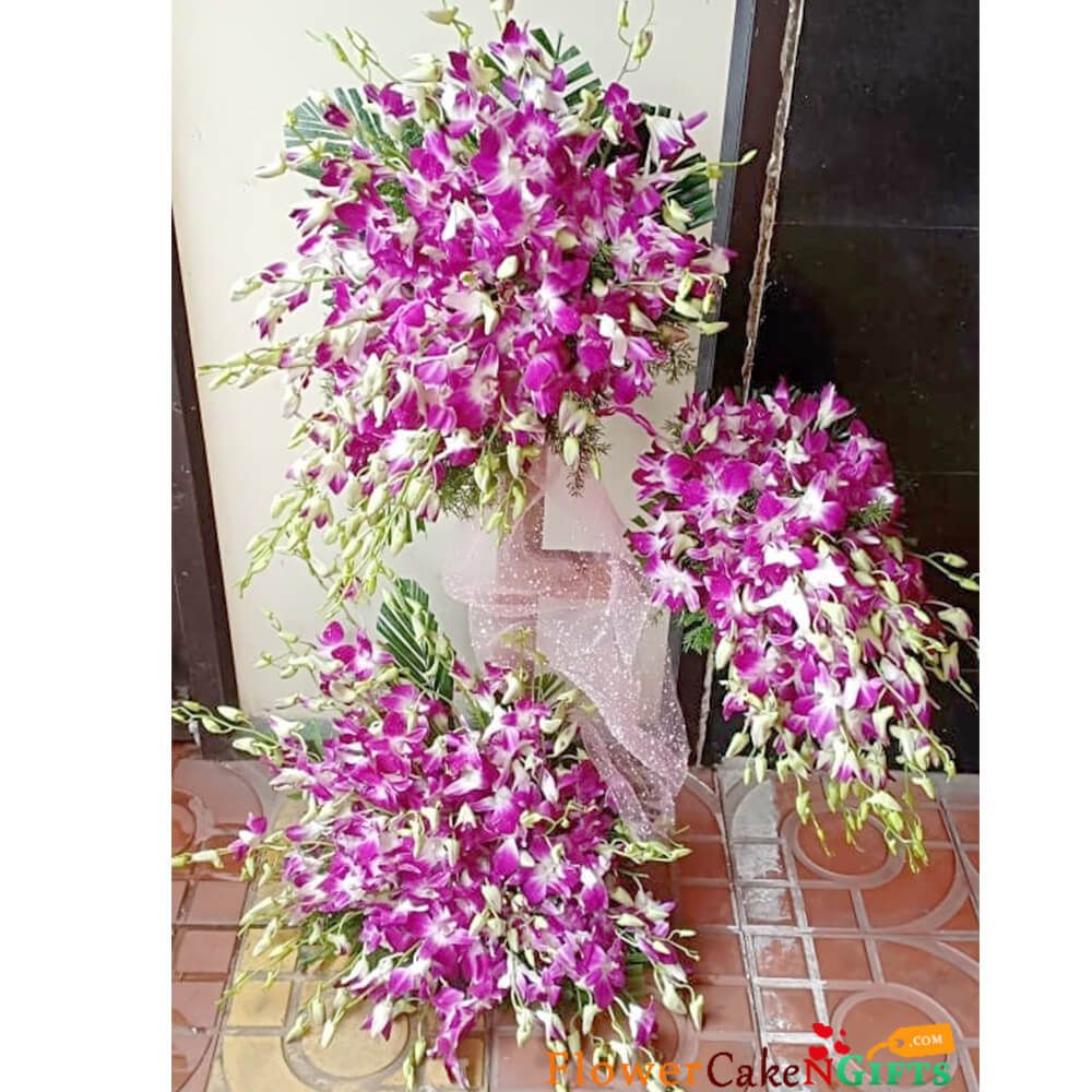 send hearty purple orchid tall arrangement delivery