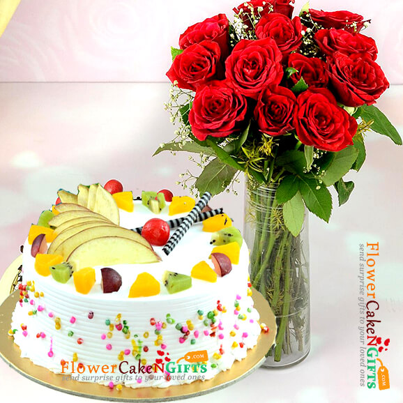 send half kg eggless fruit cake n 12 pink roses in a vase delivery