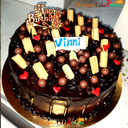 send half kg eggless special chocolate dripping cake delivery