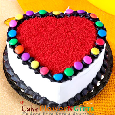 send half kg eggless hearty red Velvet Gems Cake delivery