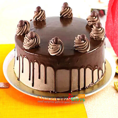 send half kg decorated chocolate truffle cake delivery