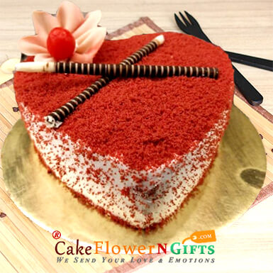 send half kg red velvet heart shape cake delivery