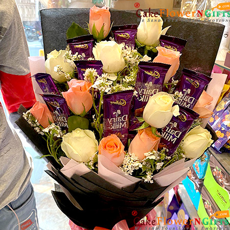 send 6 pink 6 white rose dairy milk chocolate bouquet delivery