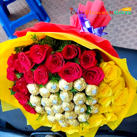 send 30 red yellow roses and 24 ferrero rocher chocolate bouquet delivery
