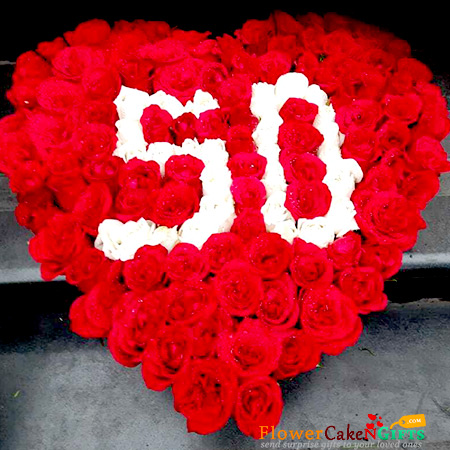 send 100 roses Heart shaped arrangement delivery
